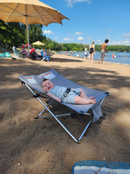 The Breezy Baby portable infant outdoor chair with full shade canopy