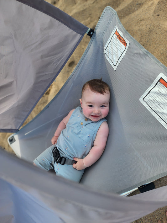 The Breezy Baby portable infant outdoor chair with full shade canopy